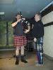 Jeff getting some bagpipe tuition from John Dickman 